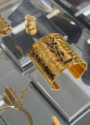 Браслет стильний золотий на одяг yves saint laurent