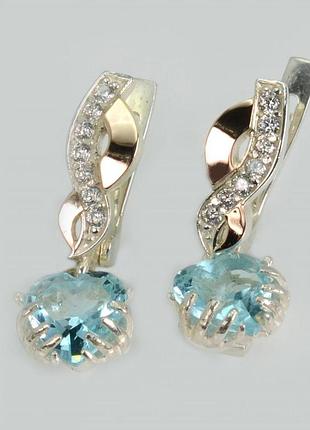 Сережки сердце в руках
