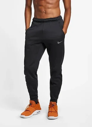 Утеплені на флісі штани nike m nk thrma pant taper 932255-010