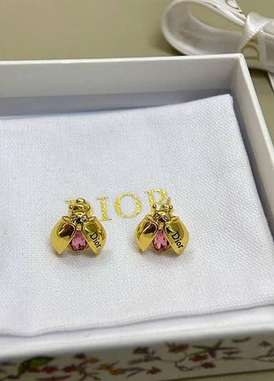 Сережки di--