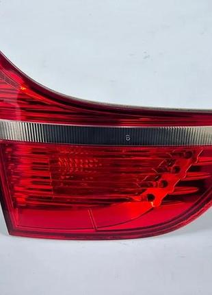 Левый стоп в крышку багажника на bmw x6 e71