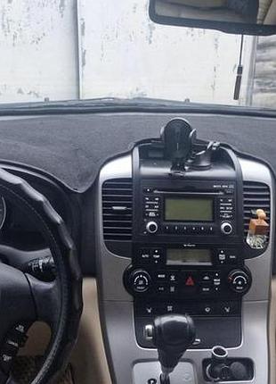 Накидка на панель приладів kia carnival (2 пок.)
