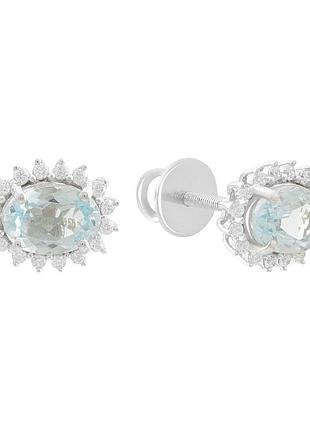 Сережки-гвіздки срібні 925 з натуральним топазом 2.194ct, родовані, форма овал