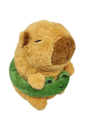 Игрушка мягкая "капибара с кругом" 19 см