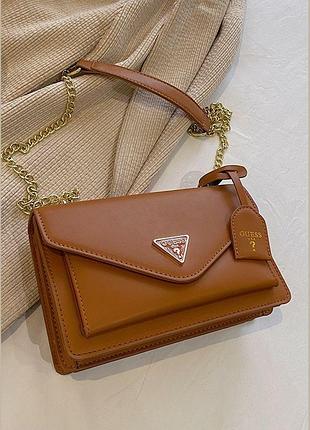 Жіноча сумка guess 18091 крос-боді коричнева