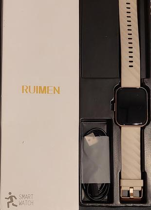 Ruimen розумний годинник (smart watch) із силіконовим ремінцем кольору рожевого золота, а також кабель для зарядження
