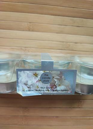 Набор ароматических свечей the candle store "fresh linen" (15 свечей + 3 подсвечника)