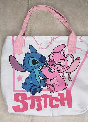 Стильна містка сумка-шопер із яскравим принтом персонажа stitch.