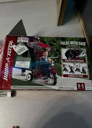 Продам оригинальный фирменный трехколесный велосипед-коляску radio flyer