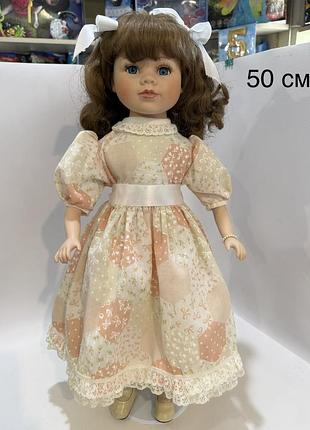 Коллекционная фарфоровая кукла высотой 50 см