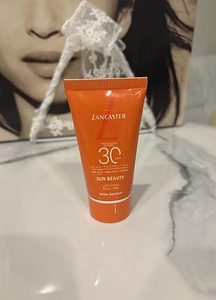 Водостійке сонцезахисне молочко для тіла lancaster sun beauty body milk spf 30 з лінійки photoaging control.