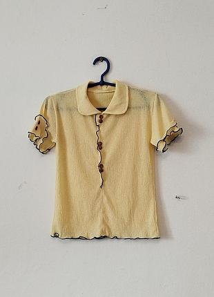 Жовта жіноча еластична блуза.