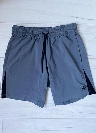 Reebok чоловічі спортивні шорти легкі літні рібок спорт сірі regular fit wor woven sport m