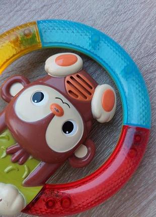Интерактивная игрушка-погремушка bright starts shake &amp; glow monkey 7