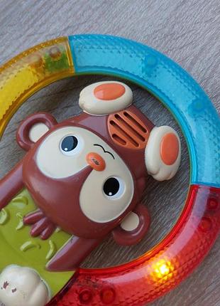 Интерактивная игрушка-погремушка bright starts shake &amp; glow monkey 5