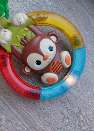 Интерактивная игрушка-погремушка bright starts shake &amp; glow monkey 6
