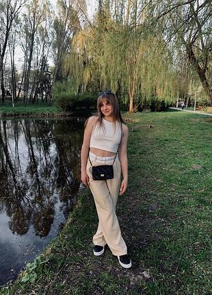 Брюки широкі