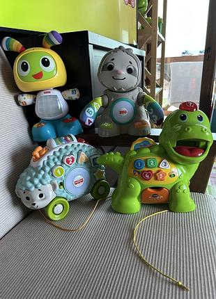 Набір дитячих розвиваючих іграшок динозаврик vtech робот бібо fisher price linkimals