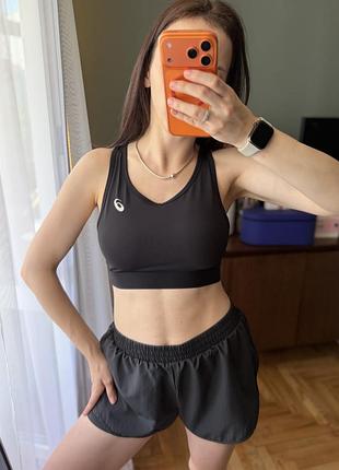 Чорний спортивний топ з чашками asics