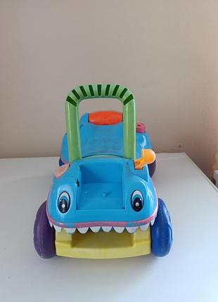 Игрушка каталка