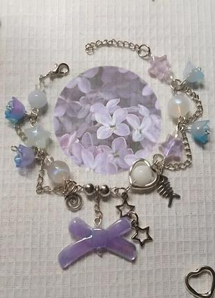 Фіолетовий браслет з бантиком💜