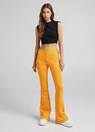 Штани-кльош bershka  жіночі жовті м