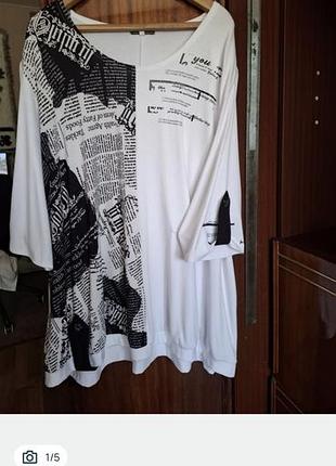 Женская футболочка р.76..хлопок с черными вставками,газетка,з полиэстера.очень в хорошем состоянии.в обращении есть.тел 098 триста 99 7 семь 14 качество +++