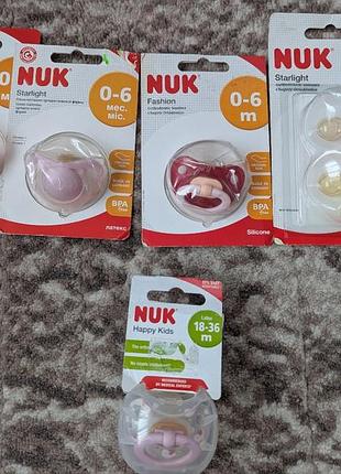 Nuk  0-6, 18-36пустушка  ортодонтична силікон латекс кругла зарізана симетрична тримач для пустушки