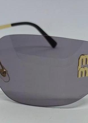 Сонцезахисні елегантні окуляри без оправи димчасті