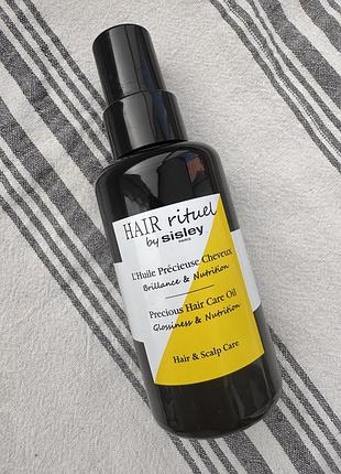 Hair rituel by sisley precious hair oil парфумована олійка