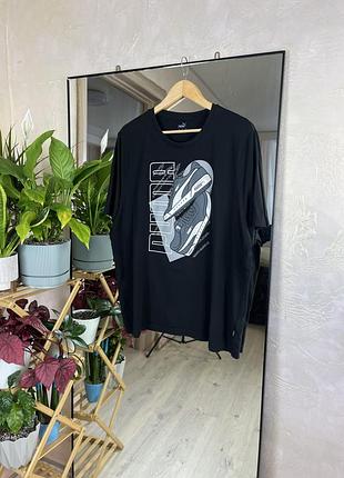 Чорна бавовняна футболка puma з акцентним графічним принтом