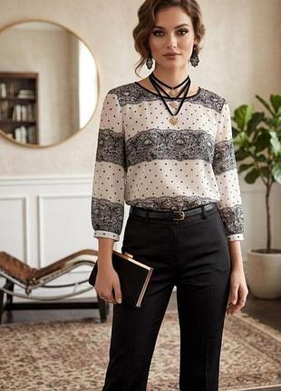 Блуза жіноча бренду dorothy perkins  з тонесенького шифону.
заміри:пог-53см, довжина виробу -62 см,довжина рукава від шиї -58 см.