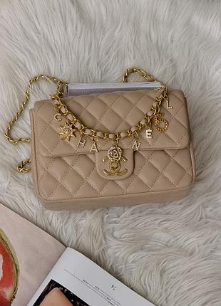 Сумка chanel mini lambskin coco charms rectangular classic flap bag бежевый е