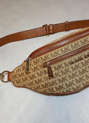 Поясна сумка від michael kors — ідеальний аксесуар для динамічного повсякденного життя, що поєднує в собі фірмову елегантність, індонезія