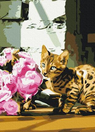 Пятнистый котик с цветами