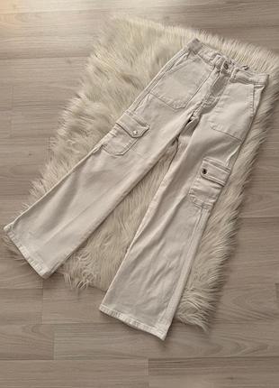 Белые джинсы клеш zara