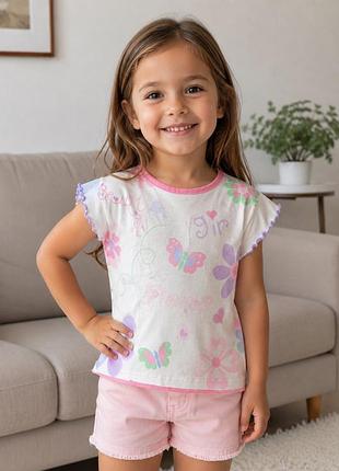 Яскрава футболка для дівчинки 🌸🦋  мила футболка білого кольору з ніжним принтом квітів, метеликів та написами.  орієнтовно на вік: 4–6 років
