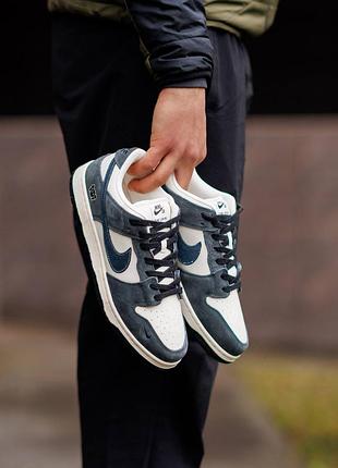 Nike sb dunk low x kaws white blue
