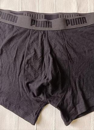 Чоловічі боксери puma виконані у чорному кольорі з еластичним поясом та контрастним логотипом.