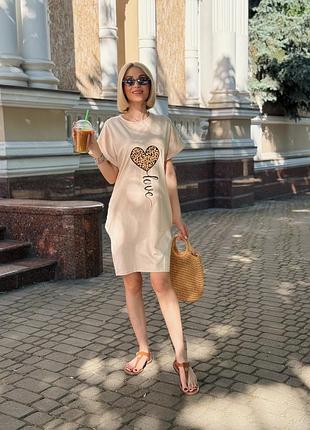 Жіноча сукня з малюнком та кишенями