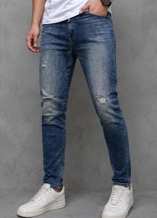 Джинси від бренду true religion