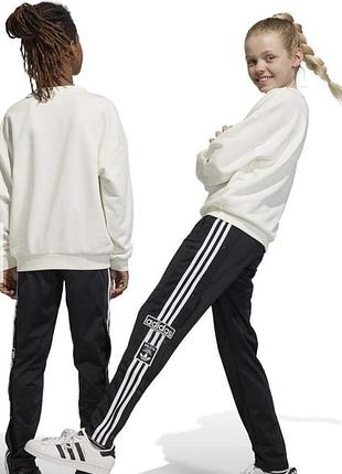 Підліткові чорні штани adidas originals adibreak з кнопками по боках  розмір 152см