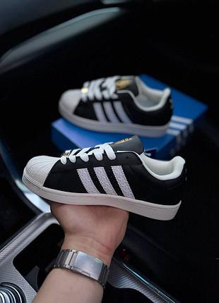 Adidas superstar black white