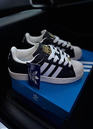 Adidas superstar black white