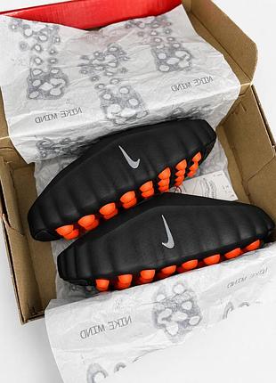 Nike mind
• black / orange •