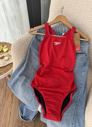 Новий суцільний червоний купальник speedo, 34р