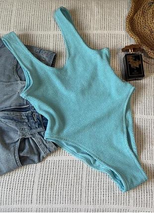 Суцільний блакитний купальник жатка з відкритою спиною розмір м primark