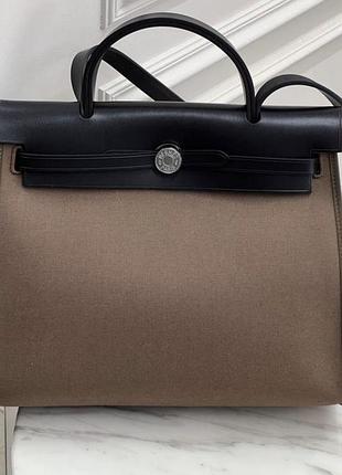 Коричнева шкіряна з текстилем сумка herbag 31 cm