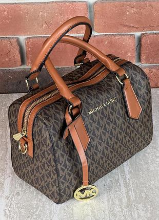 Жіноча сумка michael kors hayes duffle через плече коричневий майкл корс