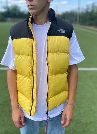 Жилетка the north face желтая